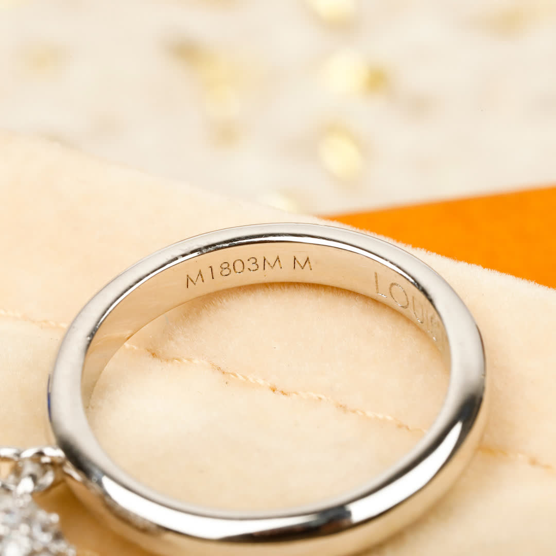 Louis Vuitton Silver Ring with Logo Charm
